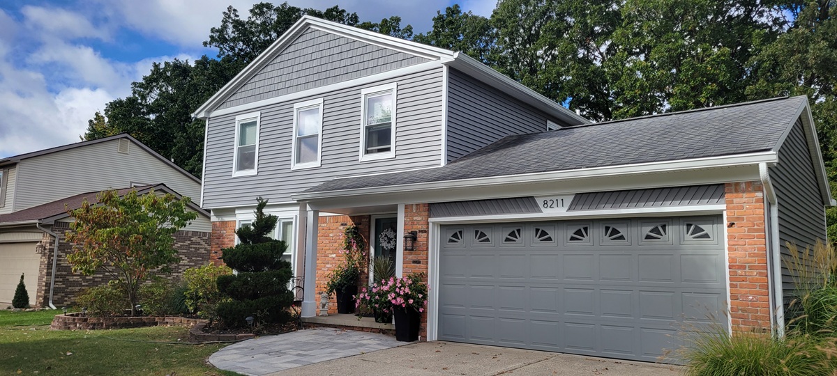 Finished siding home in Redford Township